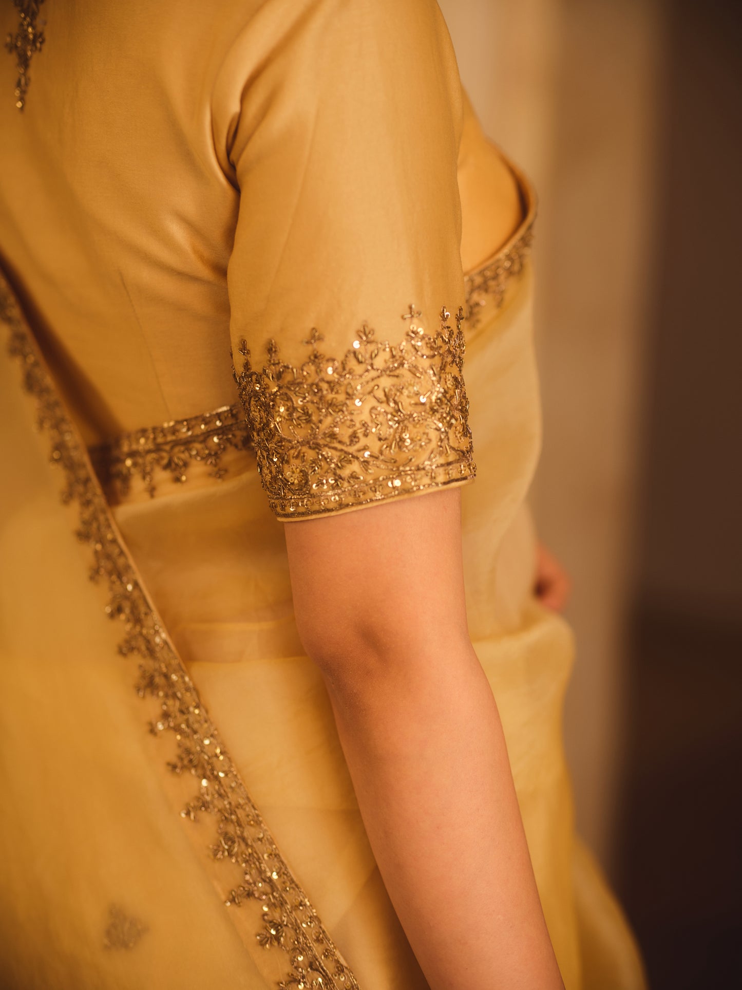 TAJRA GOLD ORGANZA SAREE WITH ZERO-NECK BLOUSE